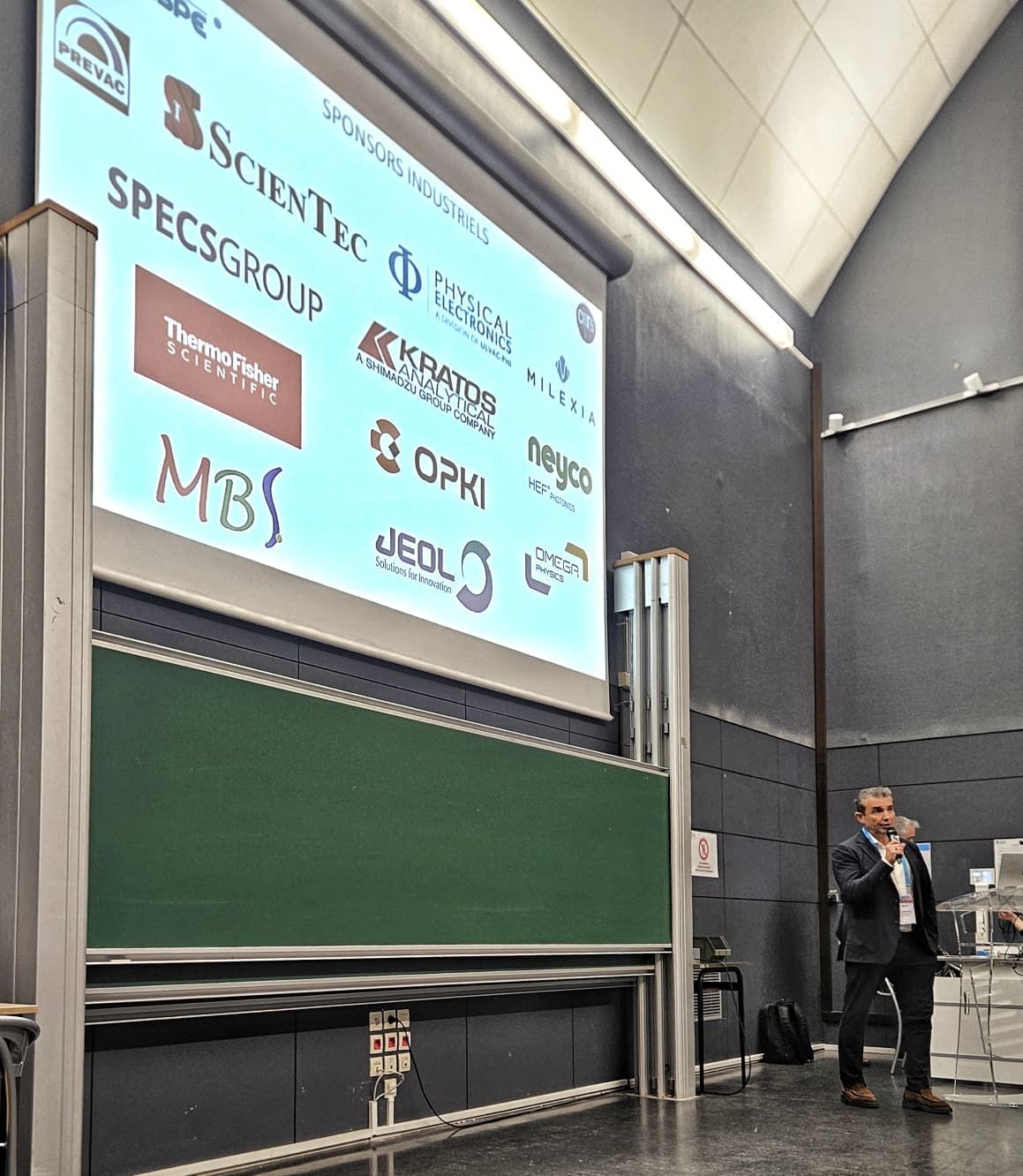 Conference auditorium with OPKI among the JNSPE industrial sponsors